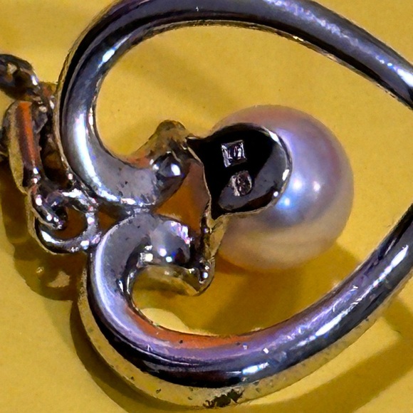 Mikimoto Silver Heart Necklace with Pearl
925 silver made. - Picture 5 of 12